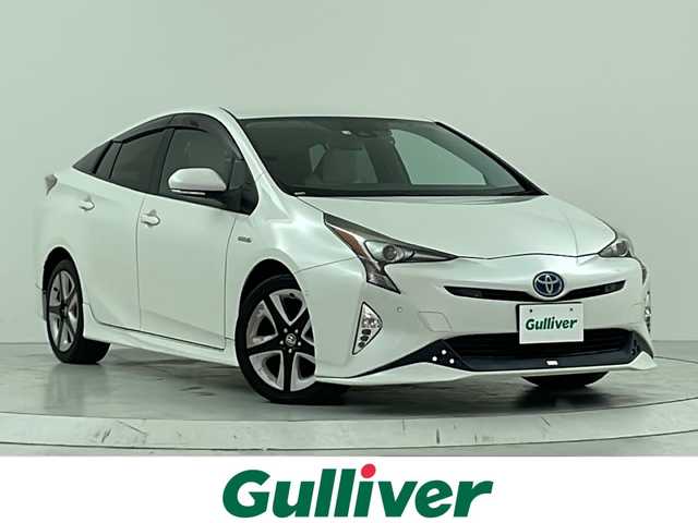 トヨタ プリウス A ツーリングセレクション 大阪府 2016(平28)年 6.3万km ホワイトパールクリスタルシャイン ＴＲＤフルエアロ/衝突軽減ブレーキ/純正９インチナビ　/CD/DVD/フルセグＴＶ/Bluetooth　/バックカメラ　/ビルトインＥＴＣ　/前後コーナーセンサー　/前後ドライブレコーダー　/追従型クルーズコントロール　/ブラインドスポットモニター/ヘッドアップディスプレイ/レーンキープアシスト/パーキングアシスト/純正１７インチアルミホイール/レザーシート/前列シートヒーター/盗難防止装置/LEDライト/フォグライト/オートライト