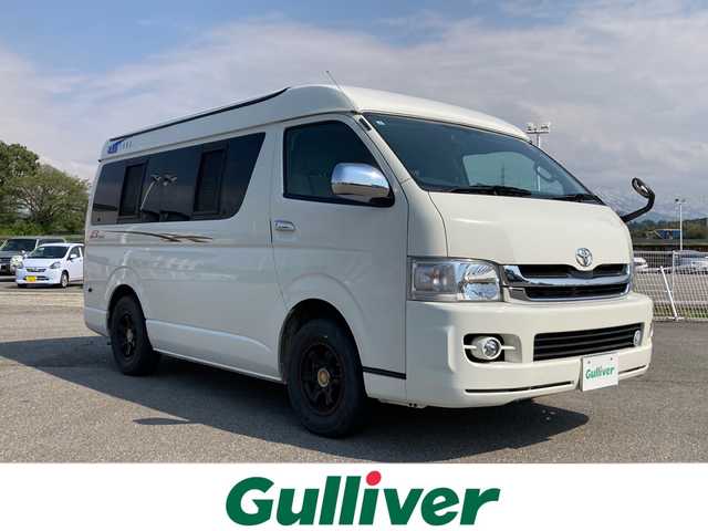 トヨタ ハイエース GL 富山県 2009(平21)年 5万km ホワイト 4WD/キャンピングカー/社外ナビ/フルセグ/給排水タンク/蛇口シンク/ルーフテント/電子レンジ/冷蔵庫/後席用テレビ