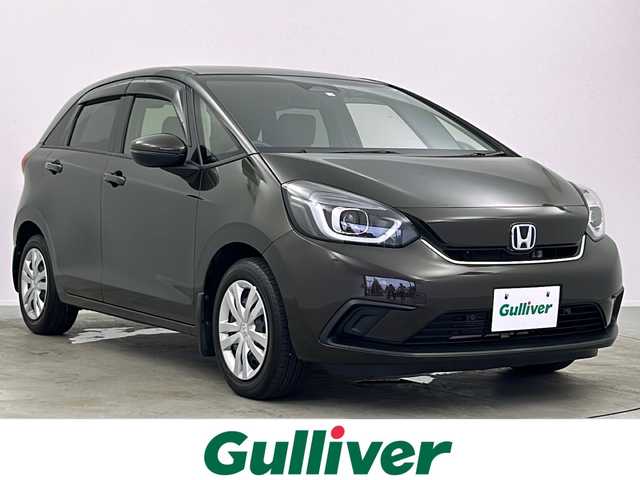 ホンダ フィット e:HEVホーム 大阪府 2020(令2)年 3.8万km プレミアムグラマラスブロンズP 純正８インチナビ/  フルセグTV/CD/DVD/Bluetooth/USB/バックモニター/横滑り防止装置/衝突軽減ブレーキ/コーナーセンサー/レーダークルーズコントロール/レーンキープアシスト/ステアリングスイッチ/アイドリングストップ/オートマチックハイビーム/純正15インチアルミホイール/ハーフレザーシート/純正フロアマット/プッシュスタート/スマートキー/ＥＴＣ/ＬＥＤライト/禁煙車