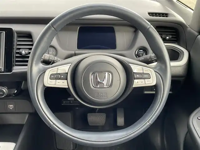 ホンダ フィット e:HEVホーム 大阪府 2020(令2)年 3.8万km プレミアムグラマラスブロンズP 純正８インチナビ/  フルセグTV/CD/DVD/Bluetooth/USB/バックモニター/横滑り防止装置/衝突軽減ブレーキ/コーナーセンサー/レーダークルーズコントロール/レーンキープアシスト/ステアリングスイッチ/アイドリングストップ/オートマチックハイビーム/純正15インチアルミホイール/ハーフレザーシート/純正フロアマット/プッシュスタート/スマートキー/ＥＴＣ/ＬＥＤライト/禁煙車