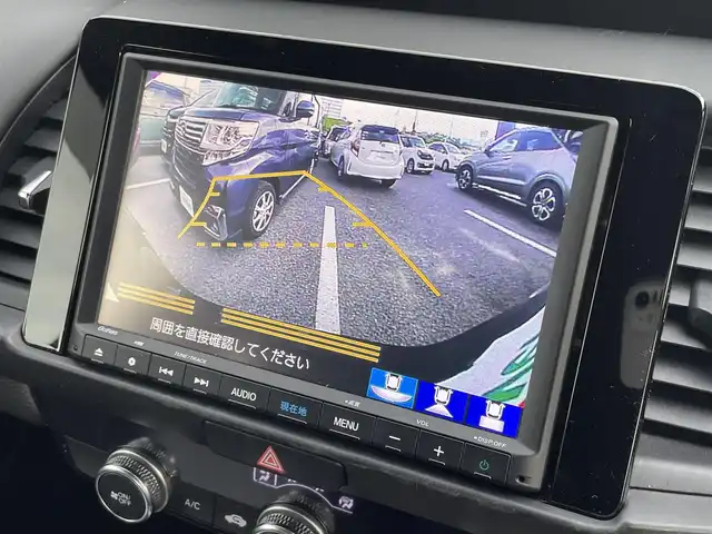 ホンダ フィット e:HEVホーム 大阪府 2020(令2)年 3.8万km プレミアムグラマラスブロンズP 純正８インチナビ/  フルセグTV/CD/DVD/Bluetooth/USB/バックモニター/横滑り防止装置/衝突軽減ブレーキ/コーナーセンサー/レーダークルーズコントロール/レーンキープアシスト/ステアリングスイッチ/アイドリングストップ/オートマチックハイビーム/純正15インチアルミホイール/ハーフレザーシート/純正フロアマット/プッシュスタート/スマートキー/ＥＴＣ/ＬＥＤライト/禁煙車