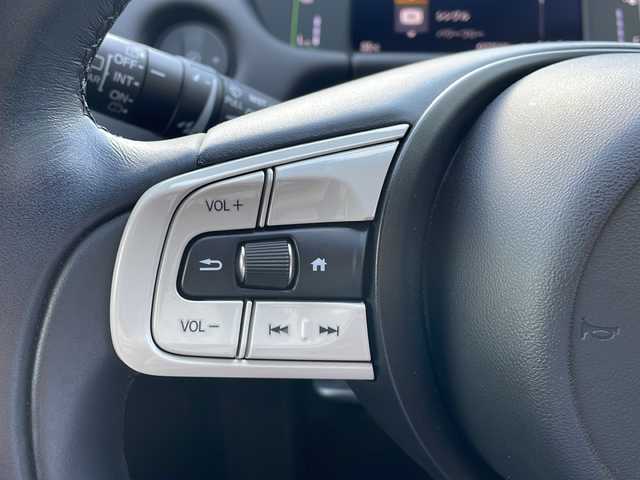 ホンダ フィット e:HEVホーム 大阪府 2020(令2)年 3.8万km プレミアムグラマラスブロンズP 純正８インチナビ/  フルセグTV/CD/DVD/Bluetooth/USB/バックモニター/横滑り防止装置/衝突軽減ブレーキ/コーナーセンサー/レーダークルーズコントロール/レーンキープアシスト/ステアリングスイッチ/アイドリングストップ/オートマチックハイビーム/純正15インチアルミホイール/ハーフレザーシート/純正フロアマット/プッシュスタート/スマートキー/ＥＴＣ/ＬＥＤライト/禁煙車