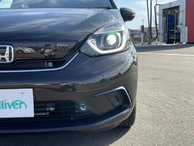 ホンダ フィット e:HEVホーム 佐賀県 2020(令2)年 3.8万km プレミアムグラマラスブロンズP 純正8インチSDナビゲーション/・フルセグTV/CD/DVD/SD/USB/Bluetooth/バックカメラ/前後ドライブレコーダー/ビルトインETC/電子パーキングブレーキ/・AUTO HOLD機能/ハーフレザーシート/ISOFIX対応/革巻きステアリング/ステアリングリモコン/純正LEDヘッドライト/・オートマチックハイビーム/純正フロアマット/純正ドアバイザ―/新車保証書/取扱説明書/ホンダセンシング/・アダプティブクルーズコントロール/・路外逸脱抑制機能/・踏み間違い衝突軽減システム/・衝突被害軽減ブレーキ/・前後パーキングセンサー