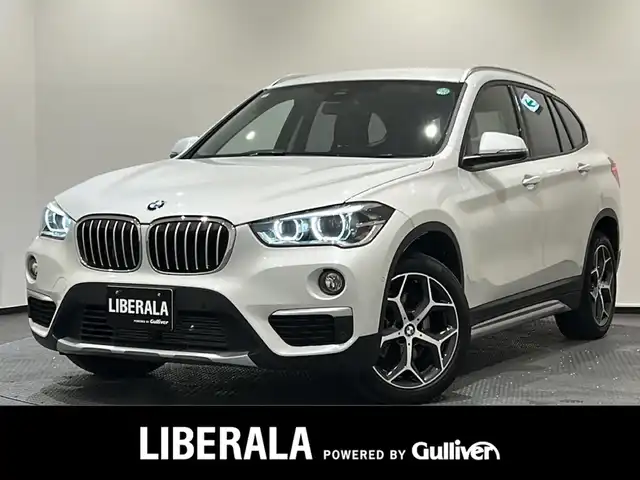 ＢＭＷ Ｘ１ xDrive 18d xライン 新潟県 2019(平31)年 2.7万km ミネラルホワイト ハイラインパッケージ/-パーフォレーテッドダコタレザーシート/-フロントシートヒーター/-オークインテリアトリム/コンフォートパッケージ/-パワーバックドア/-リヤシートスライド/-メモリ付きパワーシート/主要装備/インテリジェントセーフティ/純正HDDナビ/バックカメラ/ETC/LEDヘッドライト/純正アルミホイール/コーナーセンサー/アンビエントライト