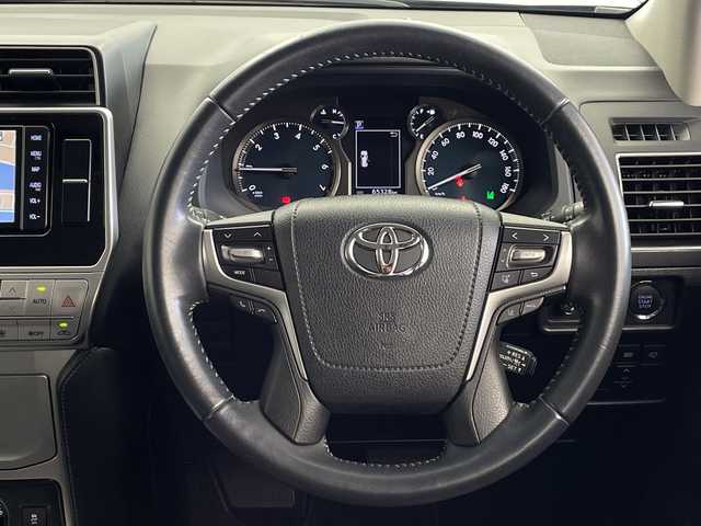 トヨタ ランドクルーザー プラド TX Lパッケージ 鹿児島県 2018(平30)年 6.6万km ブラック サンルーフ/ディーラーOPナビ/（フルセグ/Bluetooth/CD）/ドライブレコーダー/電動格納サードシート/レーダークルーズコントロール/バックカメラ/ビルドインＥＴＣ/オートハイビーム/オートライト/純正アルミホイール/シートヒーター/エアシート/ＬＥＤヘッドライト/コーナーセンサー/レーンキープアシスト/ヘッドライトウォッシャー/ドアバイザー