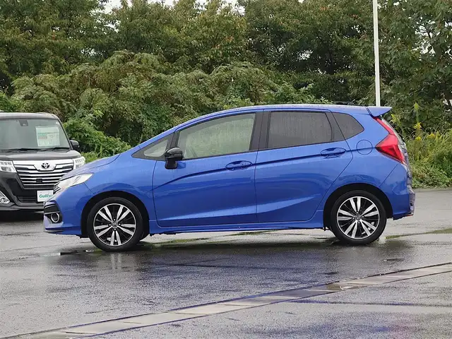 ホンダ フィット RS ホンダセンシング 山形県 2018(平30)年 9.6万km ブリリアントスポーティブルーメタリック2トーン 6MT/ホンダセンシング/純正ディスプレイオーディオ/　　【CD USB ワンセグ】/バックカメラ/レーダークルーズコントロール/LEDオートヘッドライト/純正16インチアルミホイール/アイドリングストップ/ステアリングスイッチ/電動格納ウィンカーミラー/フォグランプ/純正フロアマット/スマートキー×2/ETC
