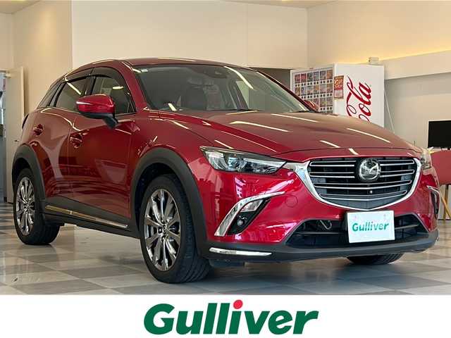 マツダ ＣＸ－３ XD エクスクルーシブモッズ 岐阜県 2018(平30)年 2.2万km ソウルレッドクリスタルM MAZDA純正ナビゲーション/4WD/全方位カメラ/フルセグテレビ/Bluetooth/CD・DVD再生/MRCC(マツダ・レーダー・クルーズ・コントロール)/空間認知支援システム/交通標識認識システム/SBS/SCBS/ドライバーアテンションアラート/ヘッドアップディスプレイ/ブラインドスポットモニター/純正ドライブレコーダー/ETC/革シート/パワーシート/シートヒーター/ステアリングヒーター/前後コーナーセンサー/LEDヘッドライト/オートライト/純正アルミホイール/純正フロアマット