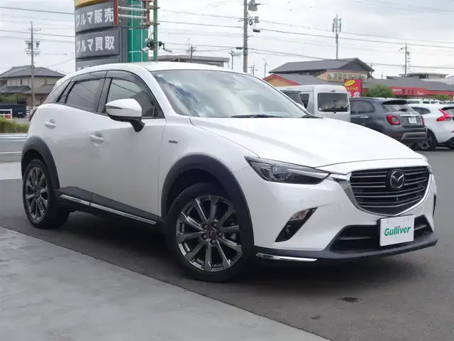 マツダ ＣＸ－３ 15S 100周年特別記念車 静岡県 2021(令3)年 4.1万km スノーフレイクホワイトパールマイカ ワンオーナー/禁煙車/純正SDナビ/　　CD/DVD/BT/SD/USB/AUX/フルセグTV/360度ビューモニター/　　　（フロント・サイド・バック・全方位）/ビルトインETC/前席シートヒーター/ステアリングリモコン/ステアリングヒーター/BOSEプレミアムサウンド/パドルシフト/運転席メモリー付きパワーシート/アドバンストスマートシティブレーキサポート/後退時スマートシティブレーキサポート/スマートシティブレーキサポート/全車速追従機能付レーダークルーズコントロール/パーキングセンサー（フロント/リア）/車線逸脱警報システム/ドライバーアテンションアラート/BSM/HUD/レザーシート/純正フロアマット/純正ドアバイザー/純正トノカバー/取扱説明書/保証書