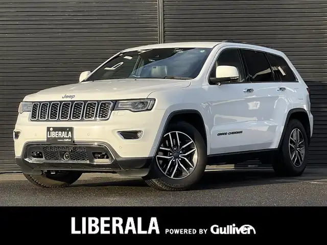 クライスラー・ジープ ジープ グランドチェロキー LTD 山梨県 2019(平31)年 6.5万km ブライトホワイト 後期　/黒革　/ＡＣＣ　/８．４ＵＣナビ　/Ｂカメラ　/フルセグＴＶ　/ＢＴ　/ＵＳＢ　/ステアリングＨ　/ＬＫＡ　/ＢＳＡ　/カープレイ　/ＨＩＤ　/Ａライト　/シートＨ　/ベンチＬ　/エアサス　/Ａブレーキアシスト　/保証書