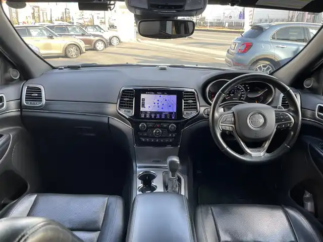 クライスラー・ジープ ジープ グランドチェロキー LTD 山梨県 2019(平31)年 6.5万km ブライトホワイト 後期　/黒革　/ＡＣＣ　/８．４ＵＣナビ　/Ｂカメラ　/フルセグＴＶ　/ＢＴ　/ＵＳＢ　/ステアリングＨ　/ＬＫＡ　/ＢＳＡ　/カープレイ　/ＨＩＤ　/Ａライト　/シートＨ　/ベンチＬ　/エアサス　/Ａブレーキアシスト　/保証書