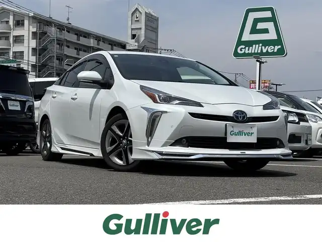トヨタ プリウス Sツーリングセレクション 大分県 2020(令2)年 3.1万km プラチナホワイトパールマイカ ・純正ナビ(CD.DVD.SD.BT)/・バックカメラ/・フルセグテレビ/・モデリスタエアロ/・プリクラッシュセーフティ/・AC100V/・コーナーセンサー/・レーダークルーズコントロール/・ETC/・ドライブレコーダー/・オートハイビーム/・シートヒーター/・ステアリングリモコン/・純正ホイール
