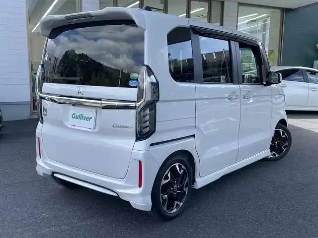 ホンダ Ｎ ＢＯＸ カスタム G EX ターボ ホンダセンシング 佐賀県 2019(令1)年 0.8万km プラチナホワイトパール プッシュスタート/両側パワースライドドア/横滑り防止/レーンキープアシスト/衝突軽減ブレーキ/ビルトインETC/ステアリングスイッチ/革巻きステアリング/パドルシフト/レーダークルーズコントロール/シートヒーター/純正SDナビ(AM/FM/CD/DVD/TV/BT)/純正フロアマット(MUGEN)/オートライト/リアサンシェード/アイドリングストップ/取扱説明書ナビ取扱説明書/保証書