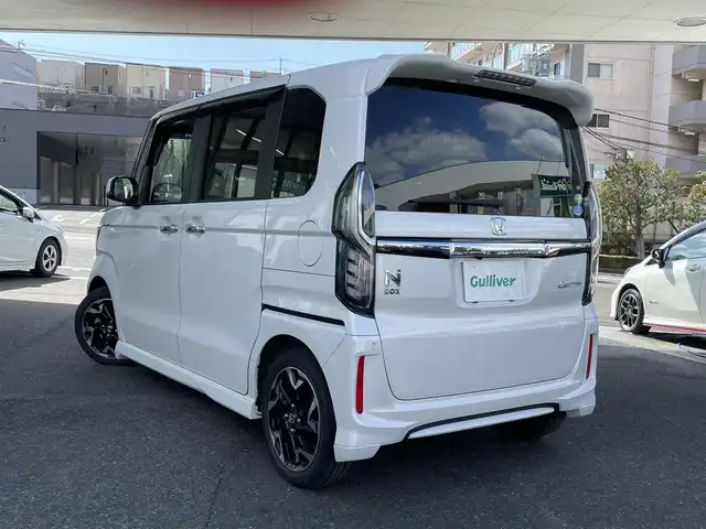 ホンダ Ｎ ＢＯＸ カスタム G EX ターボ ホンダセンシング 佐賀県 2019(令1)年 0.8万km プラチナホワイトパール プッシュスタート/両側パワースライドドア/横滑り防止/レーンキープアシスト/衝突軽減ブレーキ/ビルトインETC/ステアリングスイッチ/革巻きステアリング/パドルシフト/レーダークルーズコントロール/シートヒーター/純正SDナビ(AM/FM/CD/DVD/TV/BT)/純正フロアマット(MUGEN)/オートライト/リアサンシェード/アイドリングストップ/取扱説明書ナビ取扱説明書/保証書