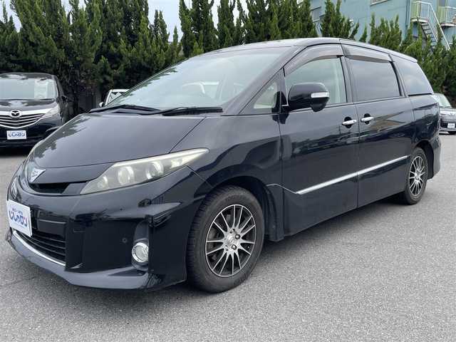 トヨタ エスティマ アエラス プレミアムエディション 和歌山県 2013(平25)年 10.3万km ブラック (株)IDOMが運営する【じしゃロン和歌山店】の自社ローン専用車両になります。こちらは現金またはオートローンご利用時の価格です。自社ローンご希望の方は別途その旨お申付け下さい/・純正ナビ/・CD/DVD/Bluetooth再生/・フルセグTV/・コーナーセンサー/・運転席パワーシート/・両側パワースライドドア/・オットマン/・バックカメラ/・ETC