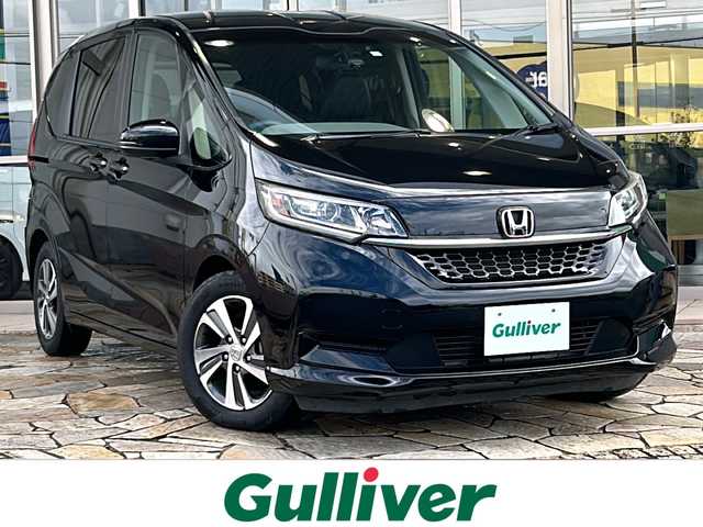 ホンダ フリード G ホンダセンシング 静岡県 2020(令2)年 3.8万km クリスタルブラックパール 純正ナビ/・CD/DVD/SD/Bluetooth/USB/ipod/・ラジオ/フルセグTV/主要装備/・レーダークルーズコントロール　/・ドライブレコーダー　/・バックカメラ　/・純正ナビ　/・シートヒーター　/・アイドリングストップ　/・両側パワースライドドア　/・ＥＴＣ　/・スマートキー　/・純正アルミホイール　/・レーンキープアシスト　/・オートライト/・プッシュスタート/・スマートキー/・ヒーテッドドアミラー/・ステアリングリモコン/・LEDヘッドライト