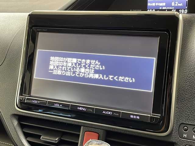 トヨタ エスクァイア Gi 新潟県 2015(平27)年 6.2万km スパークリングブラックパールクリスタルシャイン 4WD/純正9インチSDナビ(NSZT-Y64T)/CD/DVD/BT/フルセグテレビ/フロント/バックカメラ/ETC/フリップダウンモニター/ドライブレコーダー/クルーズコントロール/両側パワースライドドア/革シート/シートヒーター /ステアリングスイッチ/スマートキー/プッシュスタート/LEDヘッドライト/オートライト/オートハイビーム/フォグランプ/純正15インチアルミホイール
