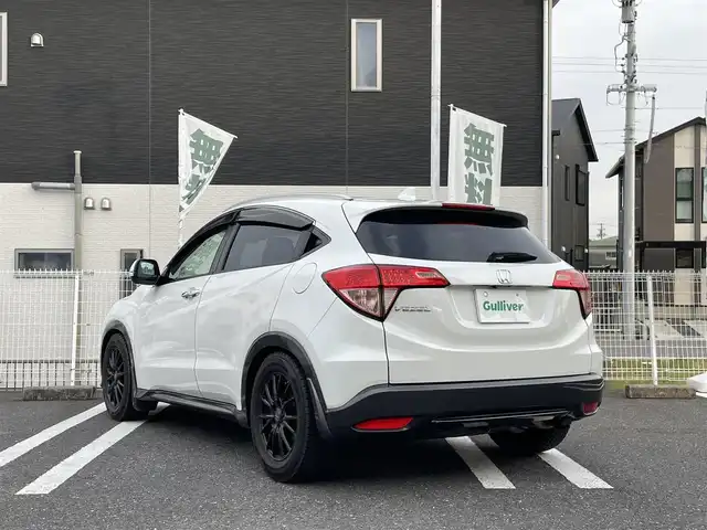 ホンダ ヴェゼル S 三重県 2014(平26)年 14万km ホワイトオーキッドパール 登録時139966km/禁煙車/ハーフレザーシート/純正ナビ/（AM/FM/TV/Bluetooth/CD/DVD）/ワンセグＴＶ/バックカメラ/ＥＴＣ/クルーズコントロール/ステアリングスイッチ/パドルシフト/アイドリングストップ/前後ドラレコ/純正フロアマット/スペアキー/オートライト