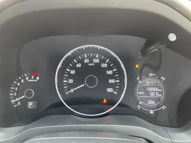 ホンダ ヴェゼル S 三重県 2014(平26)年 14万km ホワイトオーキッドパール 登録時139966km/禁煙車/ハーフレザーシート/純正ナビ/（AM/FM/TV/Bluetooth/CD/DVD）/ワンセグＴＶ/バックカメラ/ＥＴＣ/クルーズコントロール/ステアリングスイッチ/パドルシフト/アイドリングストップ/前後ドラレコ/純正フロアマット/スペアキー/オートライト