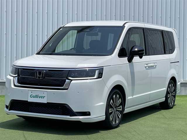 ホンダ ステップワゴン スパーダ プレミアムライン 香川県 2023(令5)年 1.7万km プラチナホワイトパール 登録時走行距離：17082km/純正11.4型ナビ/　CD DVD BT フルセグTV/全方位カメラ/両側パワースライドドア/パワーバックドア/衝突被害軽減装置/レーンキープアシスト/レーダークルーズコントロール/LEDヘッドライト/オートライト/フォグランプ/横滑り防止装置/アイドリングストップ/オートホールド機能付き電子パーキングブレーキ/ハーフレザーシート/シートヒーター/ドライブレコーダー/ビルトインETC/ロールサンシェード/ISOFIX/プッシュスタート/スマートキー