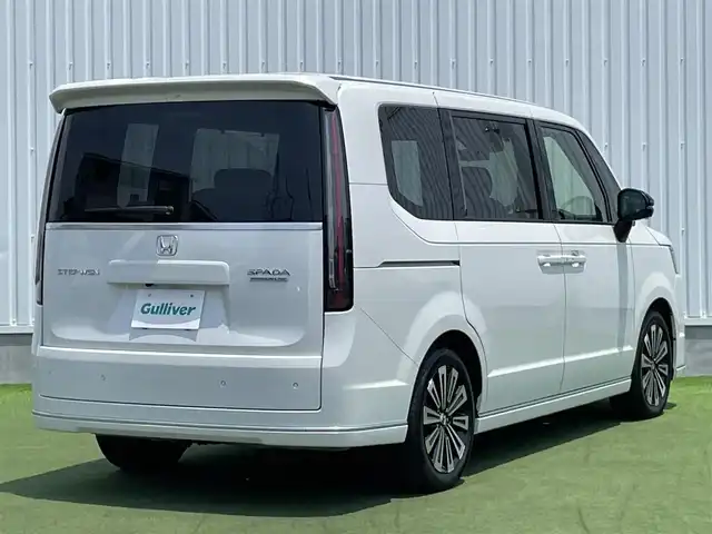 ホンダ ステップワゴン スパーダ プレミアムライン 香川県 2023(令5)年 1.7万km プラチナホワイトパール 登録時走行距離：17082km/純正11.4型ナビ/　CD DVD BT フルセグTV/全方位カメラ/両側パワースライドドア/パワーバックドア/衝突被害軽減装置/レーンキープアシスト/レーダークルーズコントロール/LEDヘッドライト/オートライト/フォグランプ/横滑り防止装置/アイドリングストップ/オートホールド機能付き電子パーキングブレーキ/ハーフレザーシート/シートヒーター/ドライブレコーダー/ビルトインETC/ロールサンシェード/ISOFIX/プッシュスタート/スマートキー