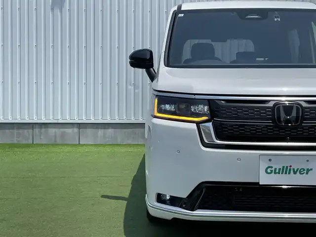 ホンダ ステップワゴン スパーダ プレミアムライン 香川県 2023(令5)年 1.7万km プラチナホワイトパール 登録時走行距離：17082km/純正11.4型ナビ/　CD DVD BT フルセグTV/全方位カメラ/両側パワースライドドア/パワーバックドア/衝突被害軽減装置/レーンキープアシスト/レーダークルーズコントロール/LEDヘッドライト/オートライト/フォグランプ/横滑り防止装置/アイドリングストップ/オートホールド機能付き電子パーキングブレーキ/ハーフレザーシート/シートヒーター/ドライブレコーダー/ビルトインETC/ロールサンシェード/ISOFIX/プッシュスタート/スマートキー
