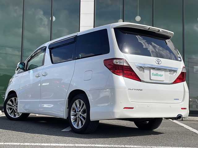 トヨタ アルファード 240S プライムセレクションⅡ 福岡県 2010(平22)年 14.3万km ホワイトパールクリスタルシャイン ・純正ナビ　フルセグ/・フリップダウンモニター/・両側パワースライドドア/・パワーバックドア/・スマートキー/・ウッドコンビうハンドル/・純正18インチアルミホイル/・フォグライト/・バックカメラ