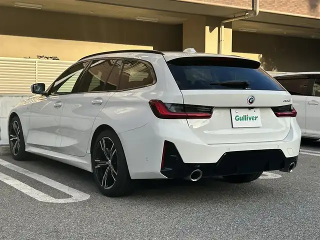 ＢＭＷ ＢＭＷ ３２０ｉ ツーリング Mスポーツ 大阪府 2023(令5)年 1.3万km アルピンホワイトⅢ コンフォートパッケージ/・オートマティック・トランク・リッド・オペレーション/・サンプロテクション・ガラス/BMWドライブ・コックピット/・BMWカープド・ディスプレイ/・HDDナビゲーション/・BMWインテリジェント・パーソナル・アシスタント/全方位カメラ/アクティブ・クルーズ・コントロール/レーン・ディバーチャー・ウォーミング/レーン・キーピング・アシスト/パーキング・アシスト・プラス/BMWヘッドアップ・ディスプレイ/シフト・パドル/ブラインドスポット/ワイヤレス・チャージング/パワーシート　D/N/シートヒーター D/N/電子パーキングブレーキ/プッシュスタート/スペアキー1本/ETC/保証書/取扱説明書/記録簿 R7 R6