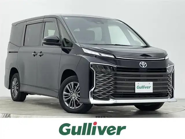 トヨタ ヴォクシー ハイブリッド S－G 宮城県 2022(令4)年 7.9万km アティチュードブラックマイカ 4WD/純正１０型ナビ/両側パワースライドドア/アダプティブクルーズコントロール/バックモニター/フルセグTV/CD/DVD/HDMI入力/スマートフォン連携/シートヒーター/ETC2.0/クリアランスソナー/パーキングサポートブレーキ/プリクラッシュセーフティ/プロドライビングアシスト/レーンディパーチャーアラート/オートマチックハイビーム/TVキャンセラー/禁煙車