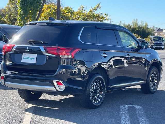 三菱 アウトランダー ＰＨＥＶ G プレミアムパッケージ 千葉県 2015(平27)年 10.6万km アメジストブラック ナビ（Ｊ－１３）　ロックフォードサウンド　パドルシフト　電動リヤゲート　ステアリングヒーター　ステアリングスイッチ　レーダークルーズ　全方位カメラ　シートヒーター　パワーシート　ＢＴ　ＥＴＣ　社外ＡＷ
