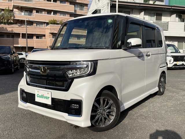 ホンダ Ｎ ＢＯＸ カスタム L 宮崎県 2021(令3)年 15.3万km プラチナホワイトパール 社外ＳＤナビ　(VXU-217NBi)/(ＢＴ/ＦＭ/ＡＭ/ＣＤ)　/両側パワースライド　/レーダークルーズコントロール　/ＥＴＣ　/レーンキープアシスト　/ドライブレコーダー前後/オートライト　/衝突被害軽減システム　/純正アルミホイール　/純正フロアマット