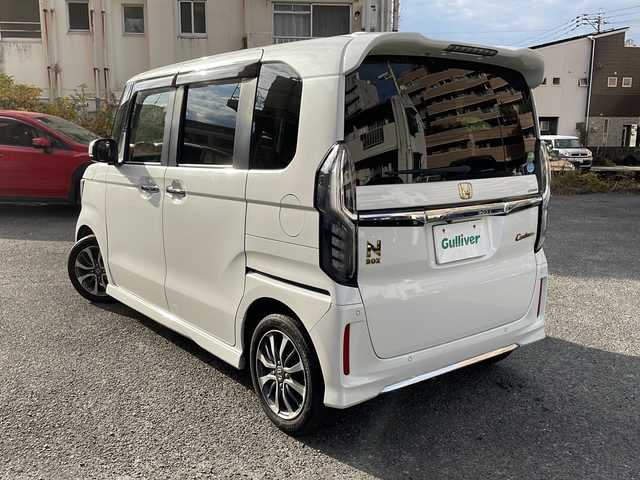ホンダ Ｎ ＢＯＸ カスタム L 宮崎県 2021(令3)年 15.3万km プラチナホワイトパール 社外ＳＤナビ　(VXU-217NBi)/(ＢＴ/ＦＭ/ＡＭ/ＣＤ)　/両側パワースライド　/レーダークルーズコントロール　/ＥＴＣ　/レーンキープアシスト　/ドライブレコーダー前後/オートライト　/衝突被害軽減システム　/純正アルミホイール　/純正フロアマット