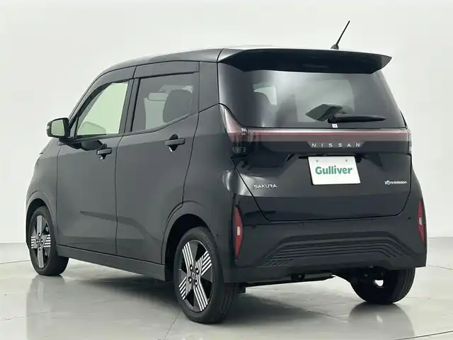 日産 サクラ G 熊本県 2022(令4)年 1.3万km ブラック ワンオーナー　/禁煙車　/純正ナビ（ＡｎｄｒｏｉｄＡｕｔｏ・ＢＴ・フルセグ・ＵＳＢ）/アラウンドビューモニター/前方ドライブレコーダー　/ビルトインＥＴＣ２．０　/レーダークルーズコントロール/プロパイロット/側方支援/エマージェンシーブレーキ/先行車発進お知らせ機能/速度標識表示/道路標識表示/駐車支援/ふらつき警報/横滑り防止/前後クリアランスソナー/運転席シートヒーター/ステアリングヒーター/オートブレーキホールド/メーカーOP１５インチAW/オートライト/LEDヘッドライト/スマートキー/プッシュスタート/スペアキー1本/保証書/取扱説明書