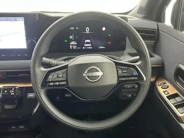 日産 サクラ G 熊本県 2022(令4)年 1.3万km ブラック ワンオーナー　/禁煙車　/純正ナビ（ＡｎｄｒｏｉｄＡｕｔｏ・ＢＴ・フルセグ・ＵＳＢ）/アラウンドビューモニター/前方ドライブレコーダー　/ビルトインＥＴＣ２．０　/レーダークルーズコントロール/プロパイロット/側方支援/エマージェンシーブレーキ/先行車発進お知らせ機能/速度標識表示/道路標識表示/駐車支援/ふらつき警報/横滑り防止/前後クリアランスソナー/運転席シートヒーター/ステアリングヒーター/オートブレーキホールド/メーカーOP１５インチAW/オートライト/LEDヘッドライト/スマートキー/プッシュスタート/スペアキー1本/保証書/取扱説明書