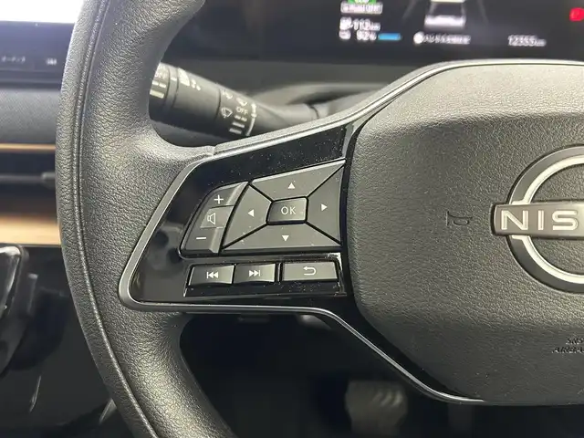 日産 サクラ G 熊本県 2022(令4)年 1.3万km ブラック ワンオーナー　/禁煙車　/純正ナビ（ＡｎｄｒｏｉｄＡｕｔｏ・ＢＴ・フルセグ・ＵＳＢ）/アラウンドビューモニター/前方ドライブレコーダー　/ビルトインＥＴＣ２．０　/レーダークルーズコントロール/プロパイロット/側方支援/エマージェンシーブレーキ/先行車発進お知らせ機能/速度標識表示/道路標識表示/駐車支援/ふらつき警報/横滑り防止/前後クリアランスソナー/運転席シートヒーター/ステアリングヒーター/オートブレーキホールド/メーカーOP１５インチAW/オートライト/LEDヘッドライト/スマートキー/プッシュスタート/スペアキー1本/保証書/取扱説明書