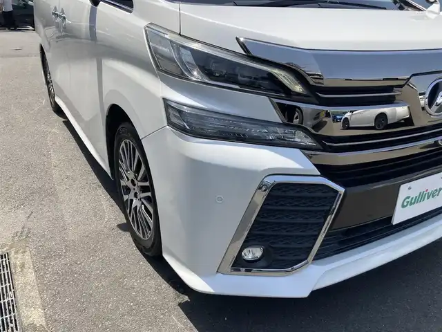 トヨタ ヴェルファイア Z Gエディション 静岡県 2015(平27)年 4.7万km ホワイトパールクリスタルシャイン 純正9インチナビ(NSZT-Y64T)/　AM FM CD DVD Bluetooth SDREC/ビルトインETC/バックモニター/LEDオートヘッドランプ/パワーシート(前席＋2列目)/ハーフレザーシート/パワーバックドア/クルーズコントロール/前後方クリアランスソナー/両側パワースライドドア/ツインムーンルーフ/純正11インチフリップダウンモニター(V11T-R62C)/フルセグTV