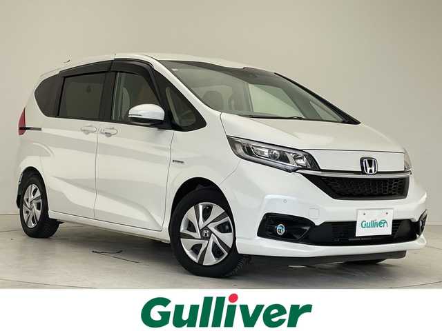 ホンダ フリード＋ ハイブリット G ホンダセンシング 愛知県 2020(令2)年 2.8万km プラチナホワイトパール 純正9型ナビ/両側パワースライドドア/クルーズコントロール/シートヒーター/バックカメラ/コーナーセンサー/LEDヘッドライト/オートマチックハイビーム/ドライブレコーダー/ETC/衝突軽減システム/フルセグ/CD DVD/ステアリングスイッチ/スマートキー/プッシュスタート