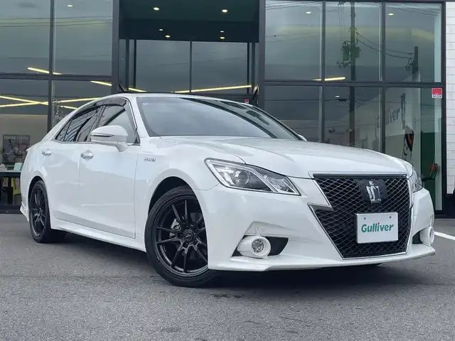 トヨタ クラウン ハイブリッド アスリートS 愛媛県 2014(平26)年 8.7万km ホワイトパールクリスタルシャイン サンルーフ/純正HDDナビ/（Bluetooth/CD/DVD/USB/フルセグTV）/TVキャンセラー/ビルトインETC/ガイド付きバックカメラ/前方ドライブレコーダー/前席パワーシート/衝突被害軽減システム/クリアランスソナー /レーダークルーズコントロール/前席シートヒーター/ステアリングヒーター/ZACKJP-520/18インチAW/社外GPSレーダー/純正フロアマット/ABS/横滑り防止装置/前後コーナーセンサー/盗難防止装置/カーテンエアバック/LEDヘッドライト/フォグランプ/オートライト
