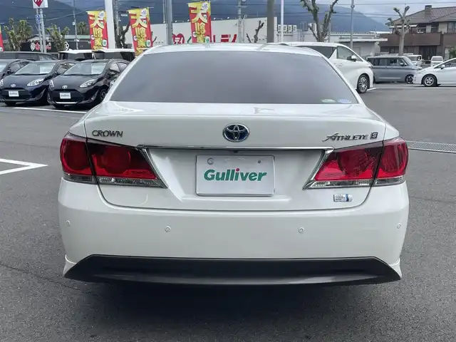 トヨタ クラウン ハイブリッド アスリートS 愛媛県 2014(平26)年 8.7万km ホワイトパールクリスタルシャイン サンルーフ/純正HDDナビ/（Bluetooth/CD/DVD/USB/フルセグTV）/TVキャンセラー/ビルトインETC/ガイド付きバックカメラ/前方ドライブレコーダー/前席パワーシート/衝突被害軽減システム/クリアランスソナー /レーダークルーズコントロール/前席シートヒーター/ステアリングヒーター/ZACKJP-520/18インチAW/社外GPSレーダー/純正フロアマット/ABS/横滑り防止装置/前後コーナーセンサー/盗難防止装置/カーテンエアバック/LEDヘッドライト/フォグランプ/オートライト