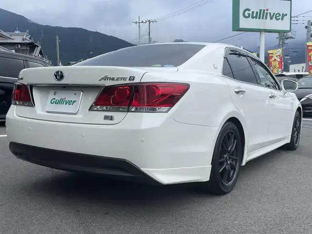 トヨタ クラウン ハイブリッド アスリートS 愛媛県 2014(平26)年 8.7万km ホワイトパールクリスタルシャイン サンルーフ/純正HDDナビ/（Bluetooth/CD/DVD/USB/フルセグTV）/TVキャンセラー/ビルトインETC/ガイド付きバックカメラ/前方ドライブレコーダー/前席パワーシート/衝突被害軽減システム/クリアランスソナー /レーダークルーズコントロール/前席シートヒーター/ステアリングヒーター/ZACKJP-520/18インチAW/社外GPSレーダー/純正フロアマット/ABS/横滑り防止装置/前後コーナーセンサー/盗難防止装置/カーテンエアバック/LEDヘッドライト/フォグランプ/オートライト