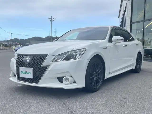 トヨタ クラウン ハイブリッド アスリートS 愛媛県 2014(平26)年 8.7万km ホワイトパールクリスタルシャイン サンルーフ/純正HDDナビ/（Bluetooth/CD/DVD/USB/フルセグTV）/TVキャンセラー/ビルトインETC/ガイド付きバックカメラ/前方ドライブレコーダー/前席パワーシート/衝突被害軽減システム/クリアランスソナー /レーダークルーズコントロール/前席シートヒーター/ステアリングヒーター/ZACKJP-520/18インチAW/社外GPSレーダー/純正フロアマット/ABS/横滑り防止装置/前後コーナーセンサー/盗難防止装置/カーテンエアバック/LEDヘッドライト/フォグランプ/オートライト