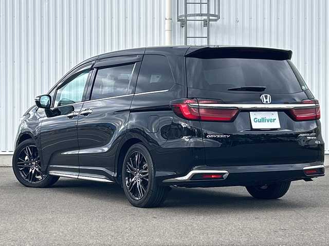 ホンダ オデッセイ ハイブリッド e:HEVアブソルート EX 愛媛県 2020(令2)年 5.1万km プレミアムスパークルブラックパール 純正ナビ/フリップダウンモニター/全方位カメラ/両側パワースライドドア/ブラインドスポットモニター/ビルトイン2.0ETC/ドライブレコーダー前後/衝突軽減システム/電動リアゲート/コーナーセンサー前後/オットマン/クルーズコントロール追従あり/合皮シート/シートヒーター/オートライトLED/レーンキープアシスト/ウォークスルー/パワーシート/フォグランプ
