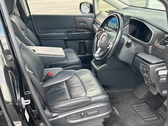 ホンダ オデッセイ ハイブリッド e:HEVアブソルート EX 愛媛県 2020(令2)年 5.1万km プレミアムスパークルブラックパール 純正ナビ/フリップダウンモニター/全方位カメラ/両側パワースライドドア/ブラインドスポットモニター/ビルトイン2.0ETC/ドライブレコーダー前後/衝突軽減システム/電動リアゲート/コーナーセンサー前後/オットマン/クルーズコントロール追従あり/合皮シート/シートヒーター/オートライトLED/レーンキープアシスト/ウォークスルー/パワーシート/フォグランプ