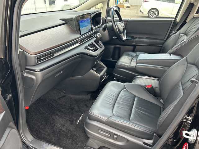 ホンダ オデッセイ ハイブリッド e:HEVアブソルート EX 愛媛県 2020(令2)年 5.1万km プレミアムスパークルブラックパール 純正ナビ/フリップダウンモニター/全方位カメラ/両側パワースライドドア/ブラインドスポットモニター/ビルトイン2.0ETC/ドライブレコーダー前後/衝突軽減システム/電動リアゲート/コーナーセンサー前後/オットマン/クルーズコントロール追従あり/合皮シート/シートヒーター/オートライトLED/レーンキープアシスト/ウォークスルー/パワーシート/フォグランプ