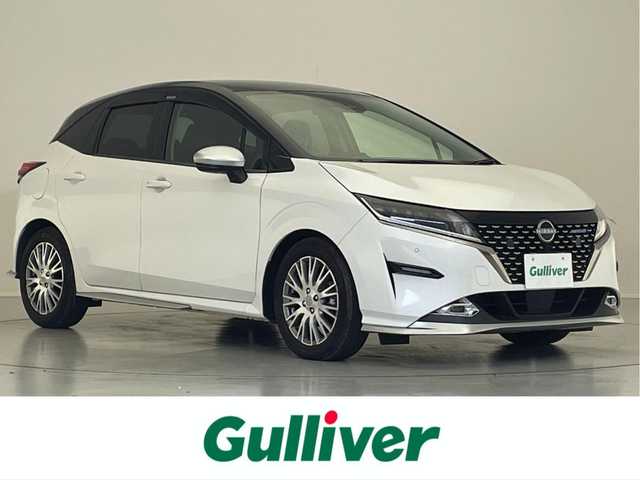 日産 ノート オーテック 滋賀県 2021(令3)年 3.6万km ピュアホワイトパール / スーパーブラック 2トーン 禁煙車/純正９型ナビ/【Bluetooth/フルセグTV/CD/DVD】/バックカメラ/ビルトインＥＴＣ/寒冷地仕様/・シートヒーター/・ステアリングヒーター/ＬＥＤヘッドライト/オートホールド/エマージェンシーブレーキ/オートハイビーム/コーナーセンサー/純正１６インチアルミ/スマートキー
