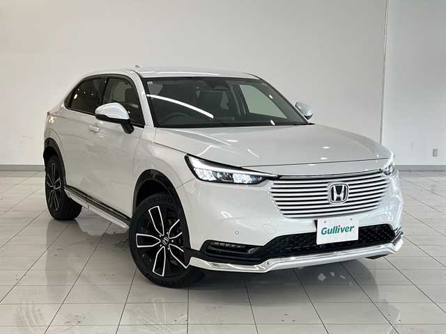 ホンダ ヴェゼル ハイブリッド e:HEV Z 新潟県 2023(令5)年 4万km プラチナホワイトパール 4WD/純正9インチコネクトナビ/BT/USB/フルセグテレビ/バックカメラ/ETC2.0/ドライブレコーダー/衝突被害軽減ブレーキ/レーンキープアシスト/レーダークルーズコントロール/半革シート/シートヒーター /ステアリングヒーター/ステアリングスイッチ/パドルシフト/コーナーセンサー/スマートキー/プッシュスタート/LEDヘッドライト/オートライト/オートハイビーム/フォグランプ/純正18インチアルミホイール
