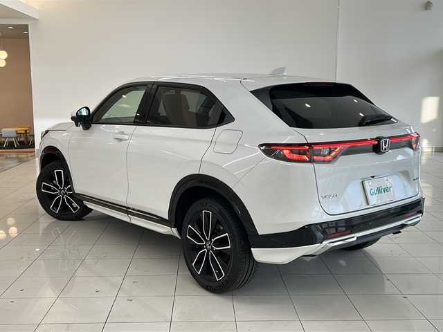 ホンダ ヴェゼル ハイブリッド e:HEV Z 新潟県 2023(令5)年 4万km プラチナホワイトパール 4WD/純正9インチコネクトナビ/BT/USB/フルセグテレビ/バックカメラ/ETC2.0/ドライブレコーダー/衝突被害軽減ブレーキ/レーンキープアシスト/レーダークルーズコントロール/半革シート/シートヒーター /ステアリングヒーター/ステアリングスイッチ/パドルシフト/コーナーセンサー/スマートキー/プッシュスタート/LEDヘッドライト/オートライト/オートハイビーム/フォグランプ/純正18インチアルミホイール