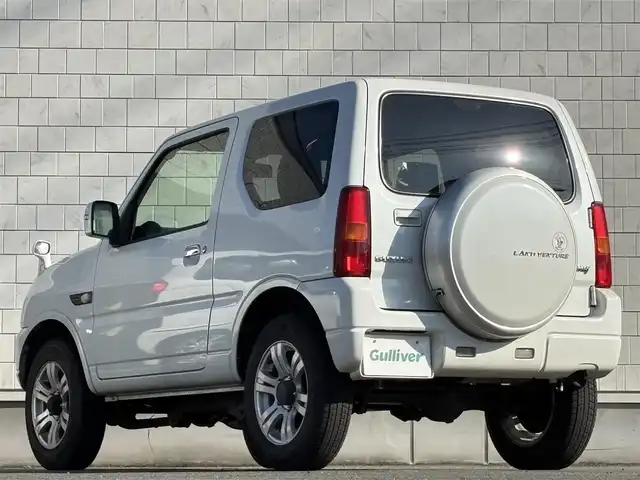 スズキ ジムニー ランドベンチャー 岩手県 2016(平28)年 7.2万km パールホワイト 禁煙車/4WD(切替)/シートヒーター/ミラーヒーター/背面タイヤ/社外ナビ/→フルセグTV/Bluetooth/CD/DVD/FM/AM/ステアリングスイッチ/〇電動格納ミラー/〇ウィンカーミラー/〇フロアマット/〇ドアバイザー/〇シガーソケット/オートライト/フォグライト/夏タイヤアルミホイール車載