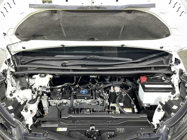 トヨタ ノア ハイブリッド S－Z 沖縄県 2023(令5)年 1.7万km ホワイトパールクリスタルシャイン 禁煙車/ワンオーナー/両側パワースライドドア/モデリスタエアロ/純正10インチナビ/（フルセグTV/BT/CD/DVD/AM/FM/USB）/バックカメラ/14インチフリップダウンモニター/トヨタセーフティセンス/・プリクラッシュセーフティ/・レーントレーシングアシスト/・レーダークルーズコントロール/・プロアクティブドライビングアシスト/・ロードサインアシスト/パワーバックドア/ブラインドスポットモニター/ヘッドアップディスプレイ/デジタルインナーミラー/オートブレーキホールド/ETC2.0/前後ドライブレコーダー/ハーフレザーシート/シートヒーター/純正アルミホイール/純正フロアマット/ドアバイザー/保証書/取扱説明書