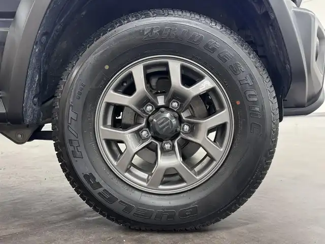 スズキ ジムニー シエラ JC 三重県 2021(令3)年 3.8万km ブルーイッシュブラックパール3 ガソリン/パートタイム4WD/フロア4AT/カロッツェリア 8インチ『楽ナビ』 AVIC-RL711/（CD/DVD/MSV/SD/FM/AM/TV/Bluetooth/iPod/USB/HDMI/AUX）/バックカメラ/ドライブレコーダー 前後/ビルトイン ETC/安全/・デュアルセンサーブレーキサポート/・車線逸脱警報機能/・ふらつき警報機能/・標識認識機能/・ハイビームアシスト/・トラクションコントロールシステム/・ヒルディセントコントロール/など/装備/・シートカバー（革調）/・クルーズコントロール/・シートヒーター（D/N）/・オートエアコン/・ステアリングスイッチ/・オートライト/・LEDヘッドランプ/・フロントフォグランプ/・プッシュスタート/・電動格納ドアミラー/・純正15inAW/・背面スペアタイヤ/・保/取/ナビ取/・スマートキーx1/など