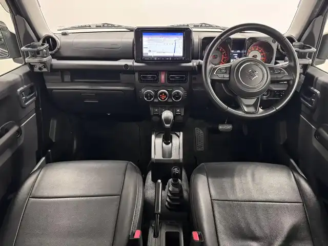 スズキ ジムニー シエラ JC 三重県 2021(令3)年 3.8万km ブルーイッシュブラックパール3 ガソリン/パートタイム4WD/フロア4AT/カロッツェリア 8インチ『楽ナビ』 AVIC-RL711/（CD/DVD/MSV/SD/FM/AM/TV/Bluetooth/iPod/USB/HDMI/AUX）/バックカメラ/ドライブレコーダー 前後/ビルトイン ETC/安全/・デュアルセンサーブレーキサポート/・車線逸脱警報機能/・ふらつき警報機能/・標識認識機能/・ハイビームアシスト/・トラクションコントロールシステム/・ヒルディセントコントロール/など/装備/・シートカバー（革調）/・クルーズコントロール/・シートヒーター（D/N）/・オートエアコン/・ステアリングスイッチ/・オートライト/・LEDヘッドランプ/・フロントフォグランプ/・プッシュスタート/・電動格納ドアミラー/・純正15inAW/・背面スペアタイヤ/・保/取/ナビ取/・スマートキーx1/など